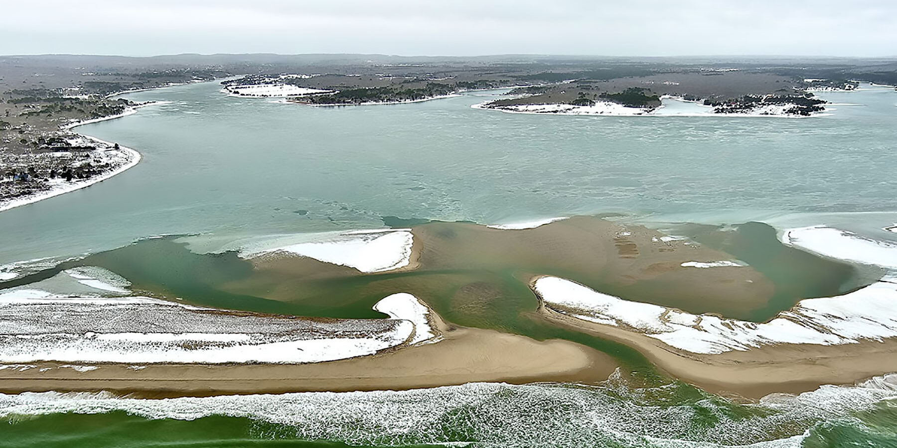 Aerial view of Martha’s Vineyard coastline and great ponds representing community collaboration in conservation.